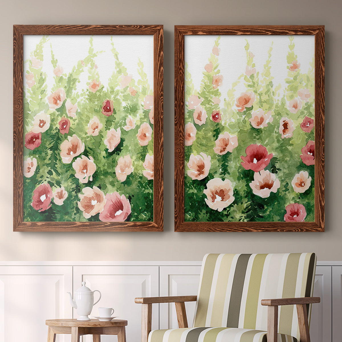 Set of two maple barnwood framed canvas prints depicting two luminous impressionistic floral paintings featuring a field of pink coral and white flowers above a sideboard in a cozy sitting room.