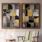 Set of two maple barnwood framed canvas prints depicting two structured modern abstracts featuring interlocking black gray cream and gold geometric sections above a sideboard in a cozy sitting room.