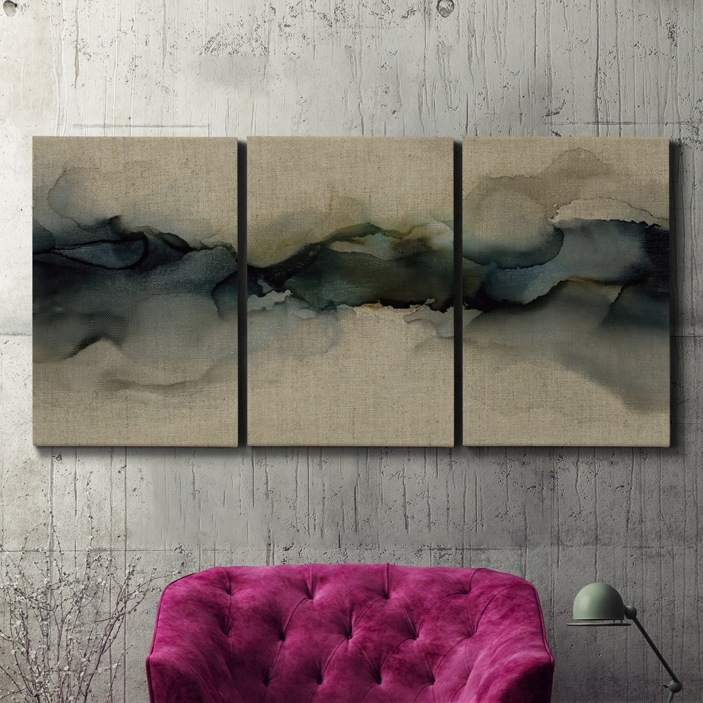 Three-panel canvas wall art featuring calm abstract water surface stillness, displayed in a living room above a suede accent chair.
