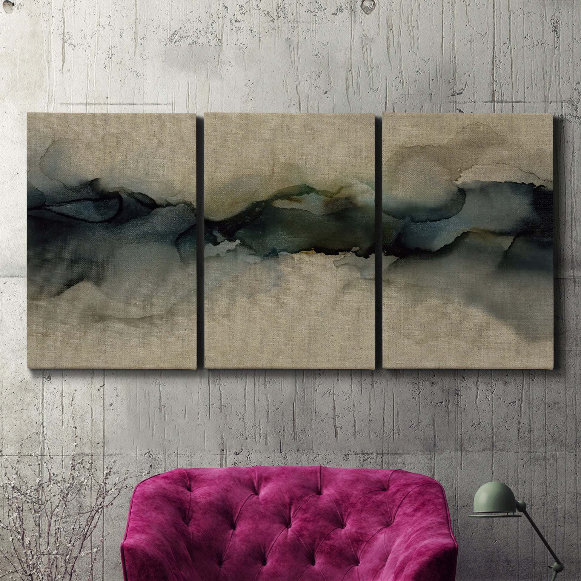 Three-panel canvas wall art featuring calm abstract water surface stillness, displayed in a living room above a suede accent chair.