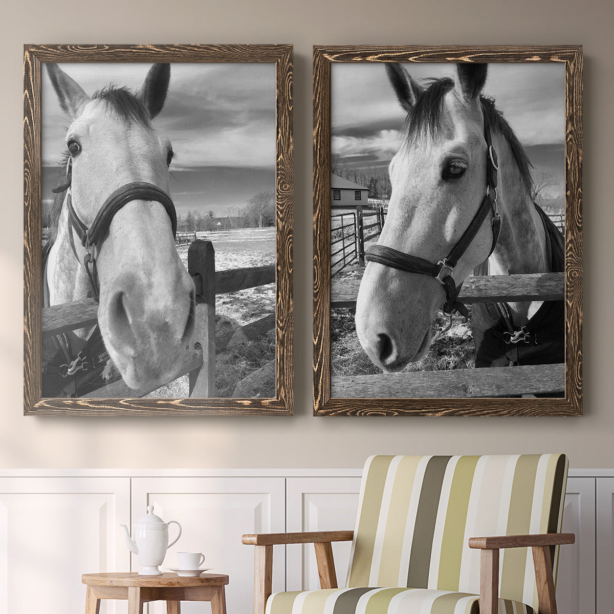 Set of two walnut barnwood framed canvas prints depicting two modern equestrian photography featuring black-and-white close-up portraits of horses at fences above a sideboard in a cozy sitting room.