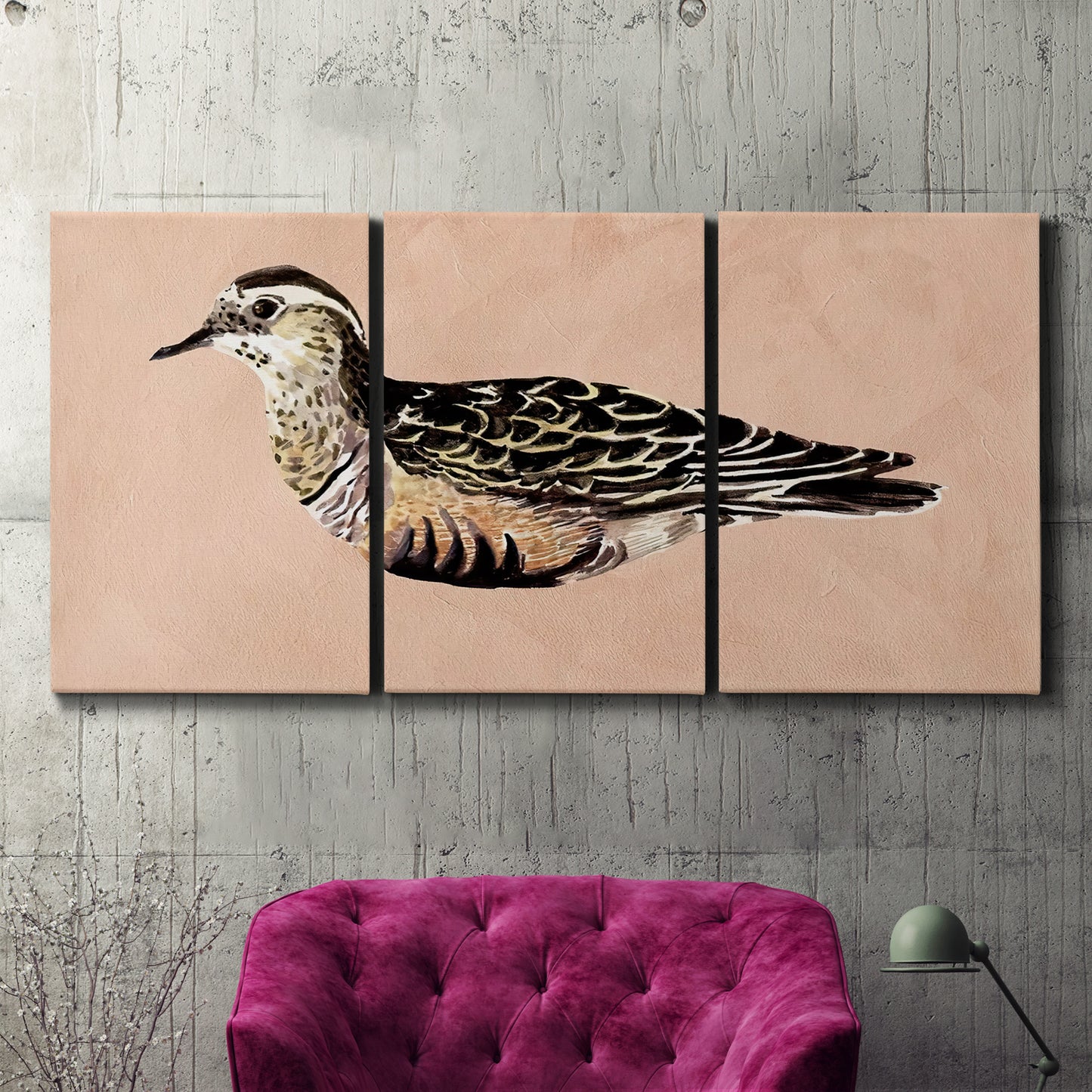 Three-panel canvas wall art featuring coastal bird illustration, displayed in a living room above a suede accent chair.