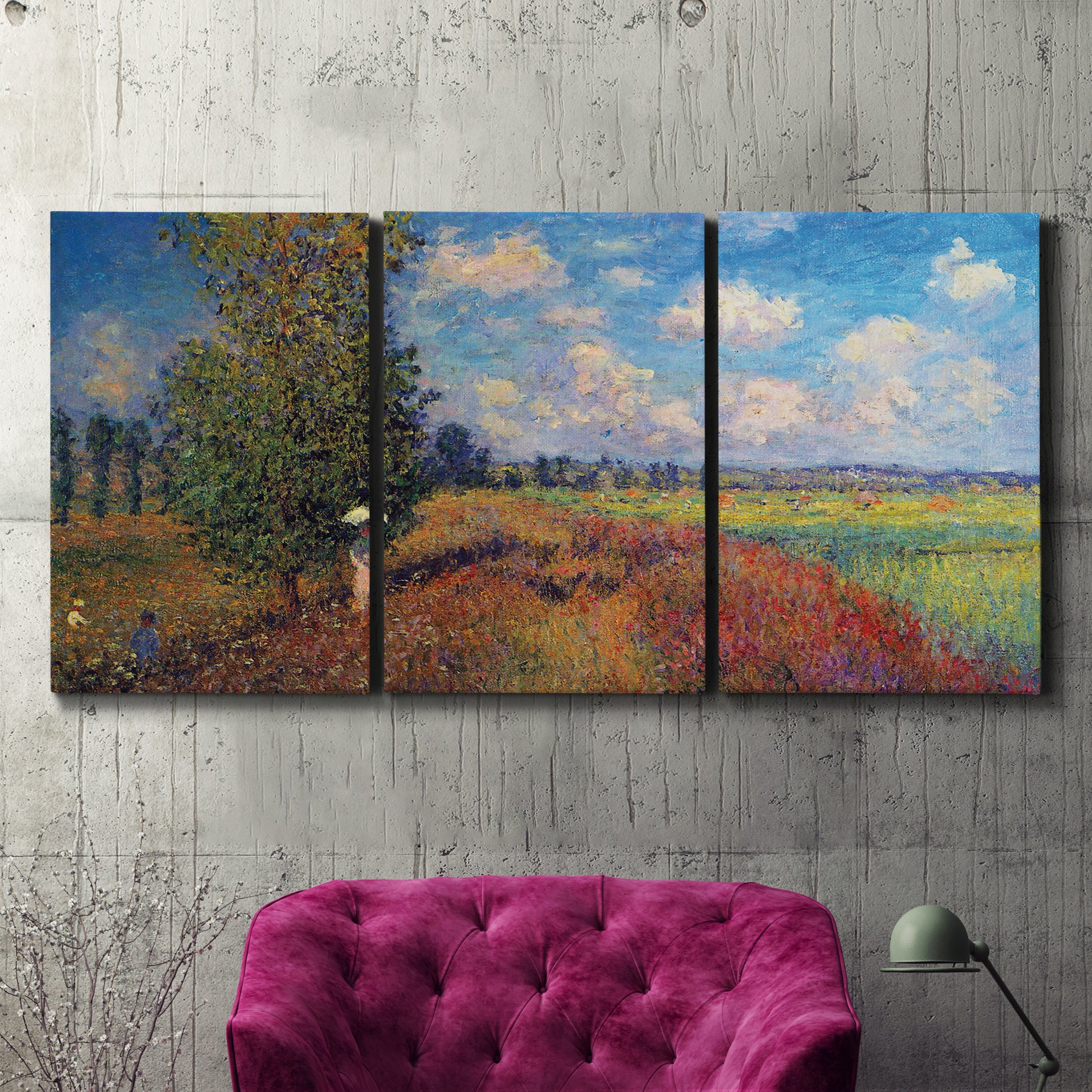 Three-panel canvas wall art featuring summer poppy field in bloom, displayed in a living room above a suede accent chair.