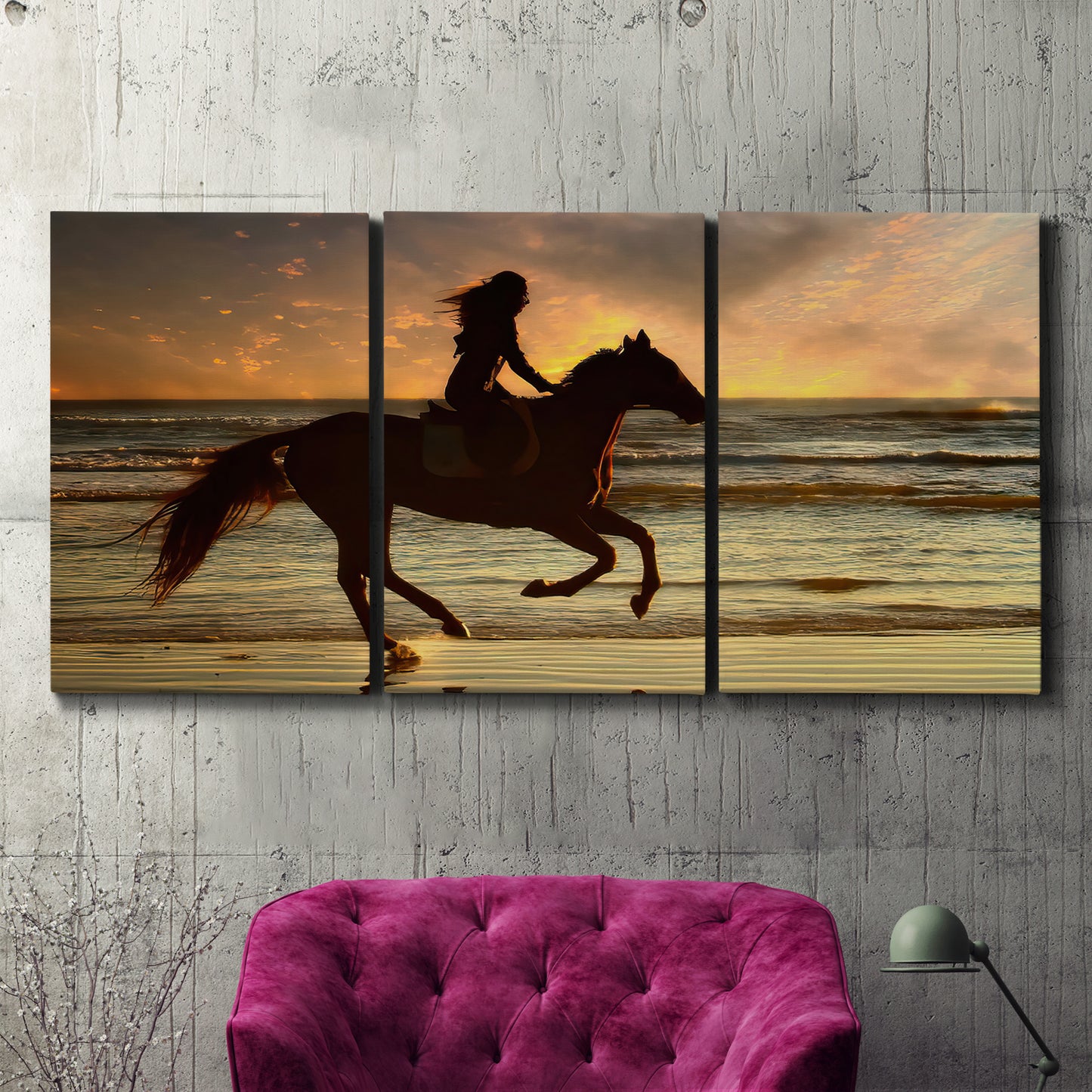 Three-panel canvas wall art featuring running horse along beach photograph, displayed in a living room above a suede accent chair.