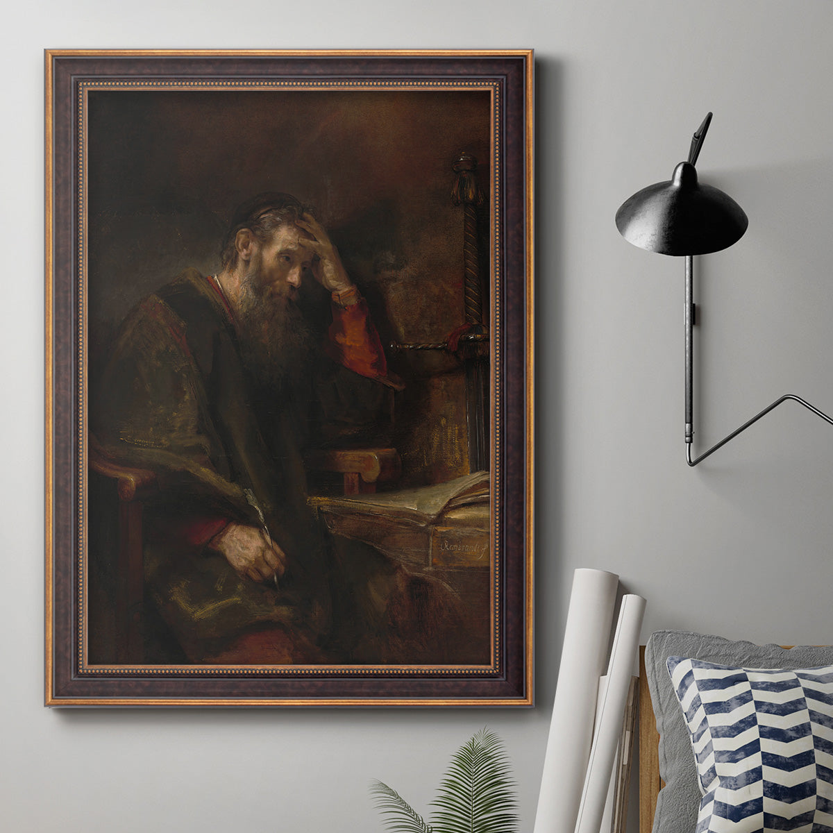 Classical religious portrait of Paul the Apostle by Rembrandt van Rijn in an ornate bronzed mahogany wood frame displayed in a neutral interior setting.