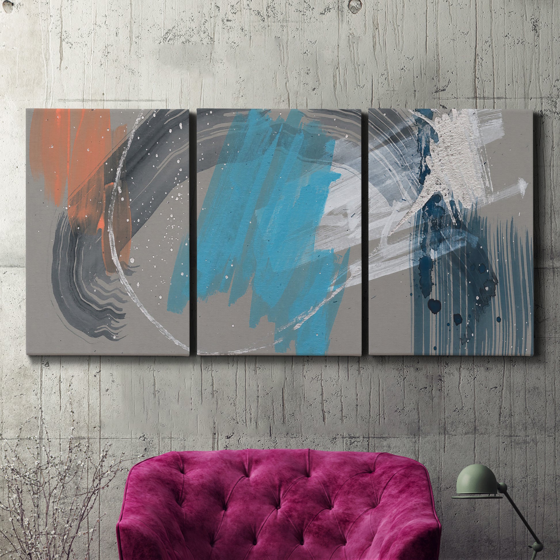 Three-panel canvas wall art featuring playful abstract mark making, displayed in a living room above a suede accent chair.
