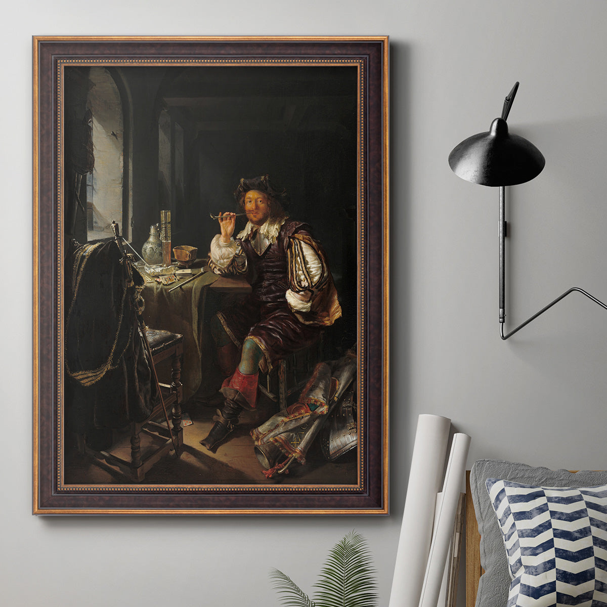 Classical portrait of a soldier smoking a pipe by Frans van Mieris the Elder in an ornate bronzed mahogany wood frame displayed in a neutral interior setting.