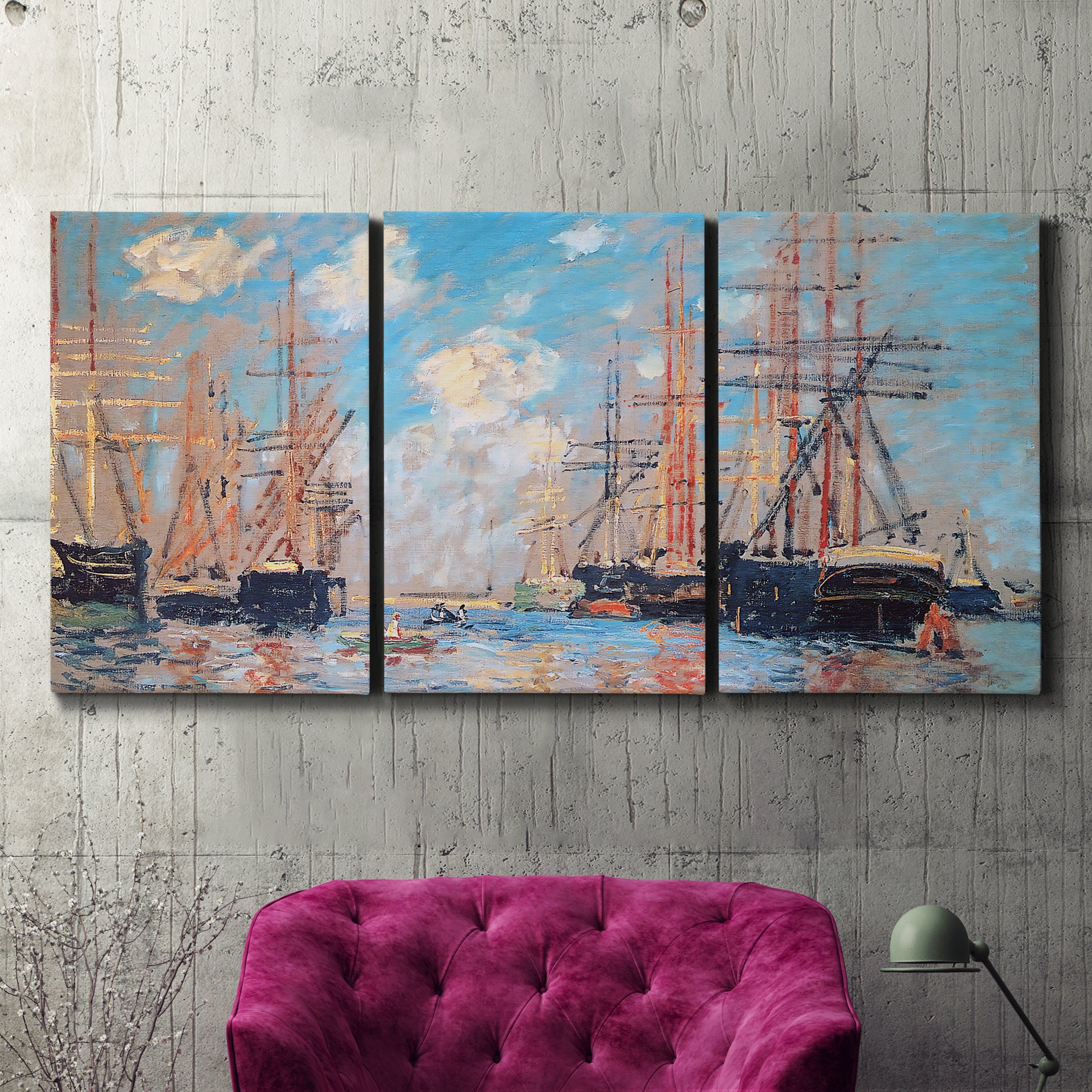 Three-panel canvas wall art featuring harbor with boats and water, displayed in a living room above a suede accent chair.