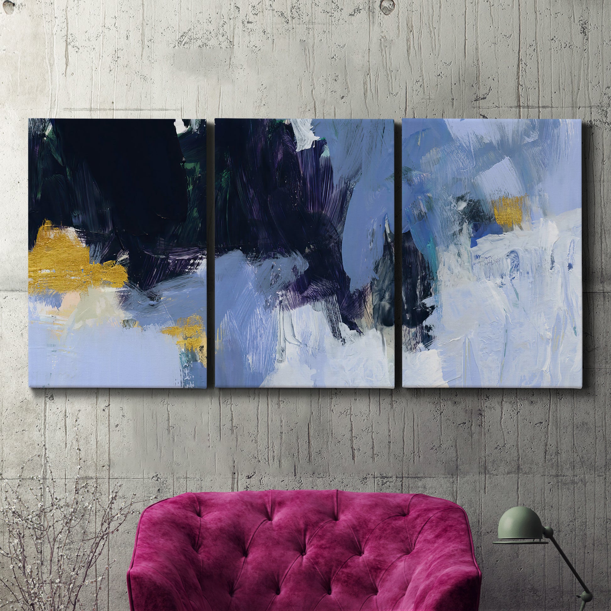 Three-panel canvas wall art featuring icy abstract arctic ledge, displayed in a living room above a suede accent chair.