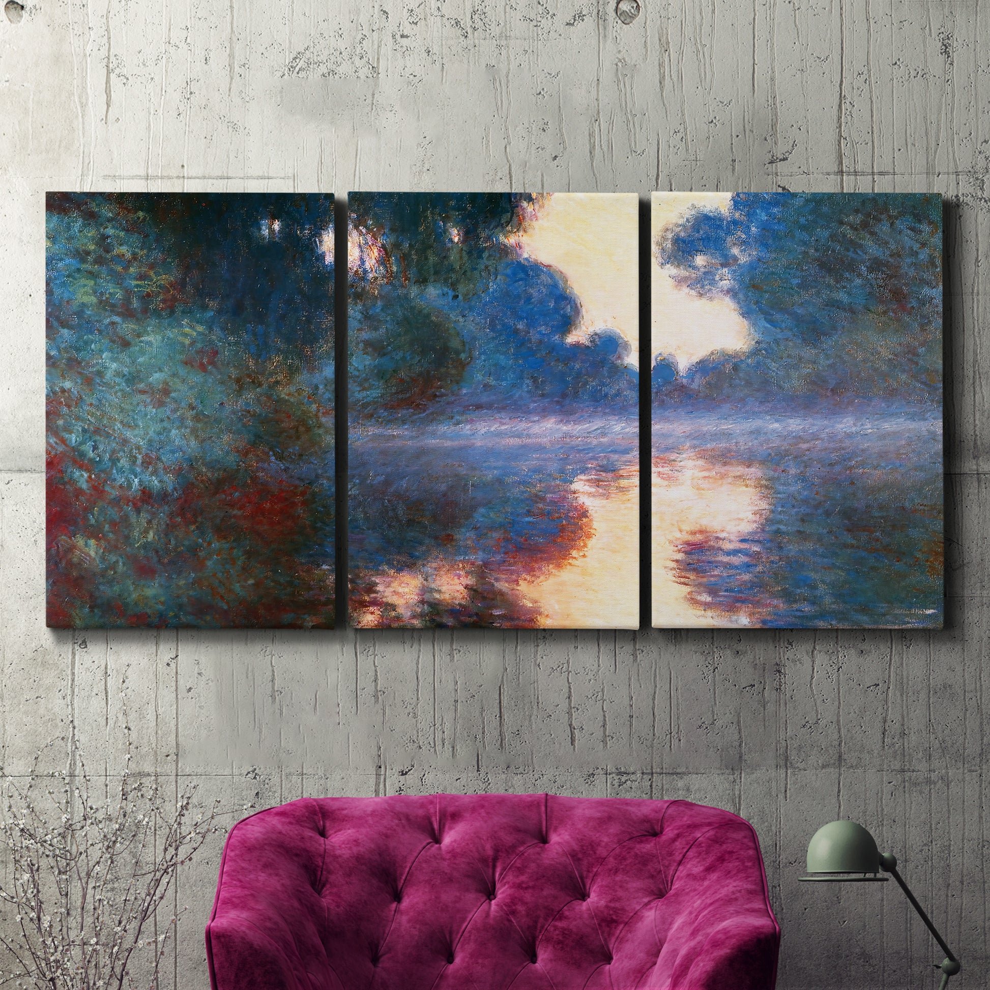 Three-panel canvas wall art featuring misty river surface at dawn, displayed in a living room above a suede accent chair.