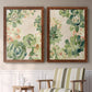 Set of two maple barnwood framed canvas prints depicting two decorative botanical pattern prints featuring dense repeating succulents and small flowers above a sideboard in a cozy sitting room.