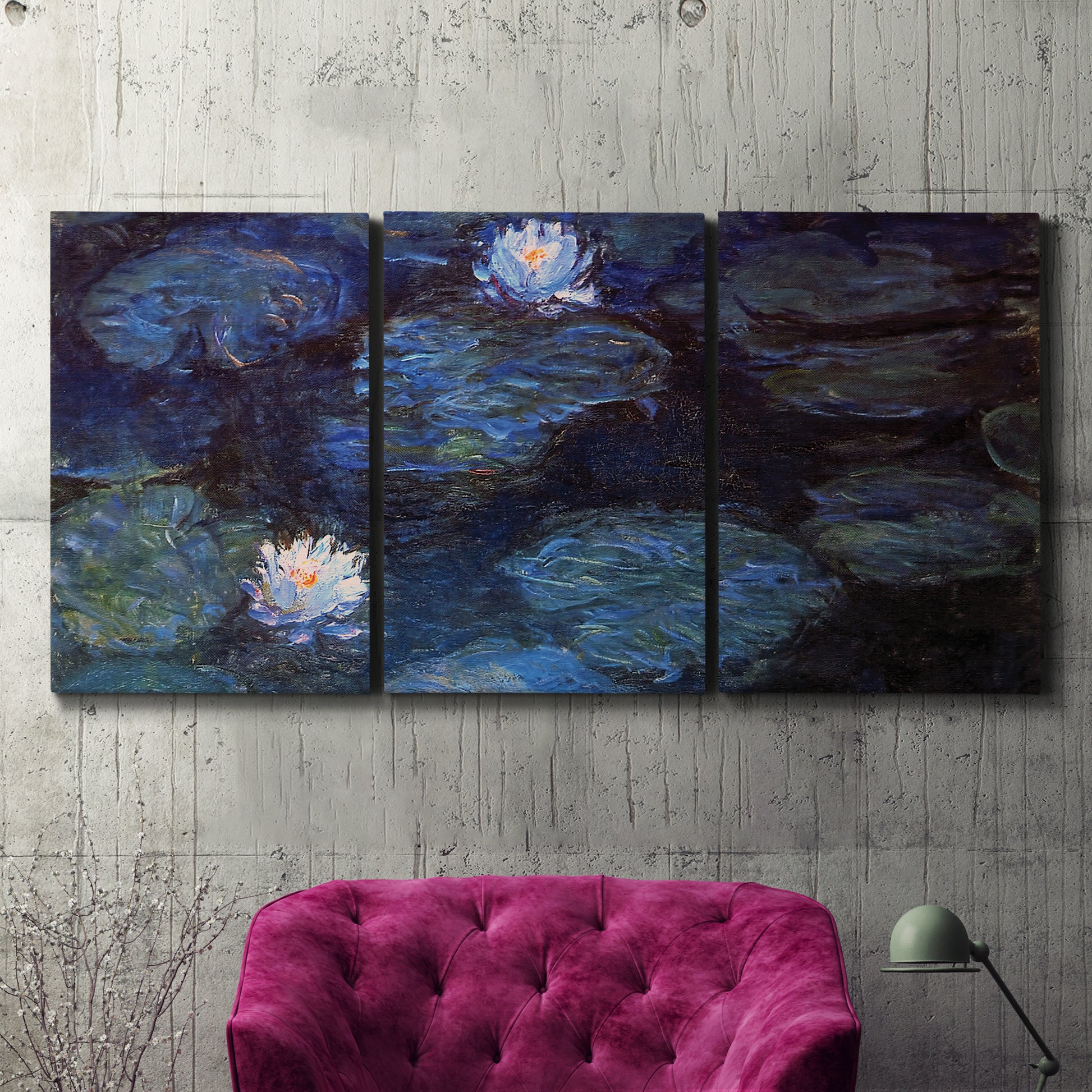 Three-panel canvas wall art featuring deep blue water lily reflections, displayed in a living room above a suede accent chair.