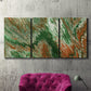 Three-panel canvas wall art featuring modern abstract layered pattern, displayed in a living room above a suede accent chair.