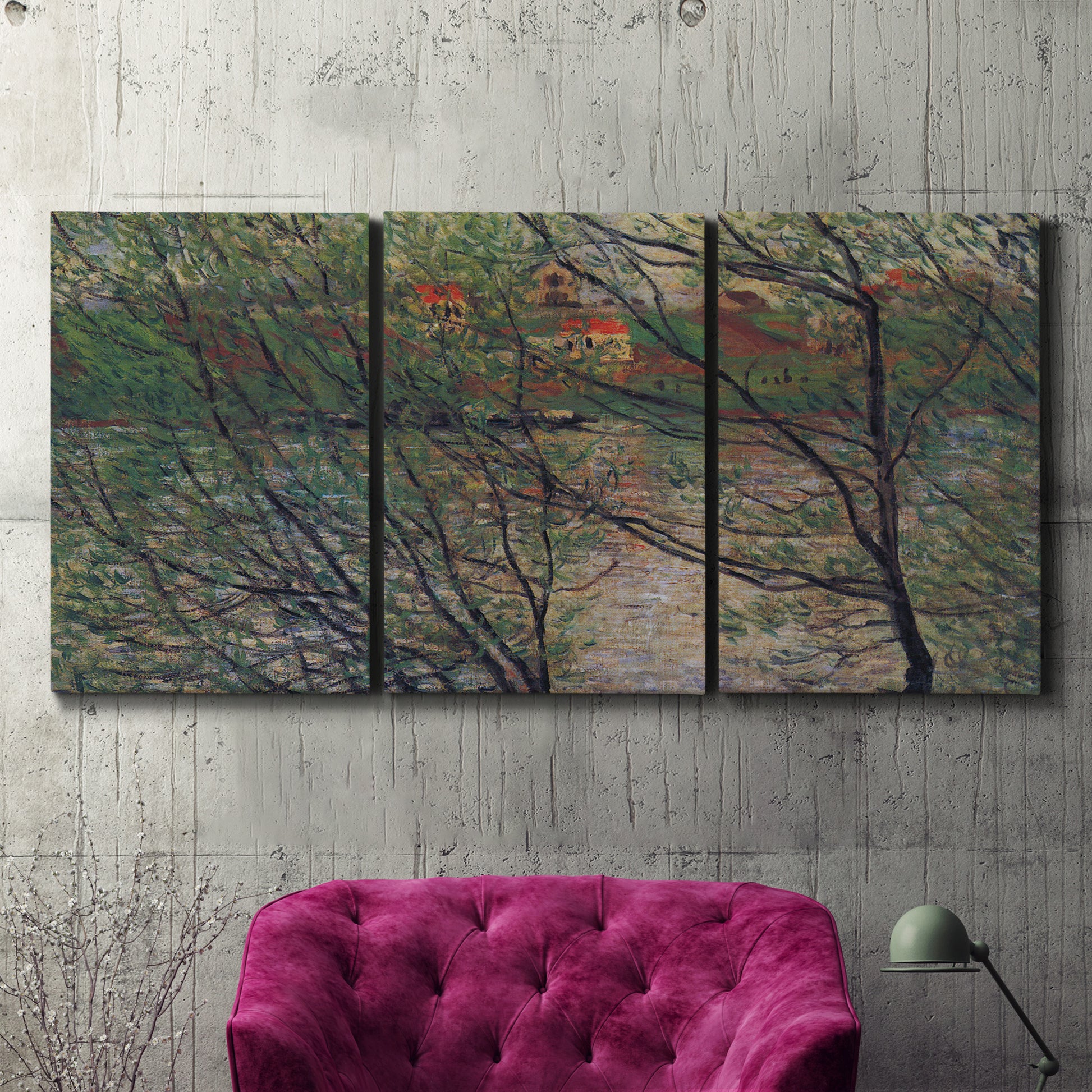 Three-panel canvas wall art featuring spring countryside with fresh foliage, displayed in a living room above a suede accent chair.