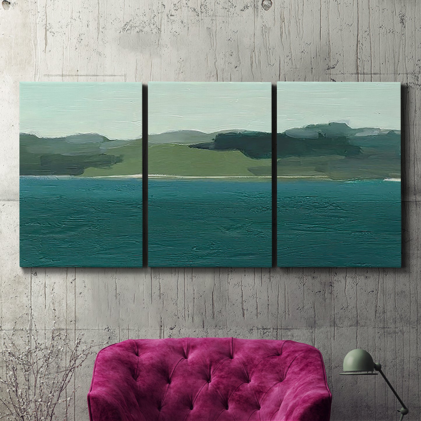 Three-panel canvas wall art featuring calm lake water under open sky, displayed in a living room above a suede accent chair.