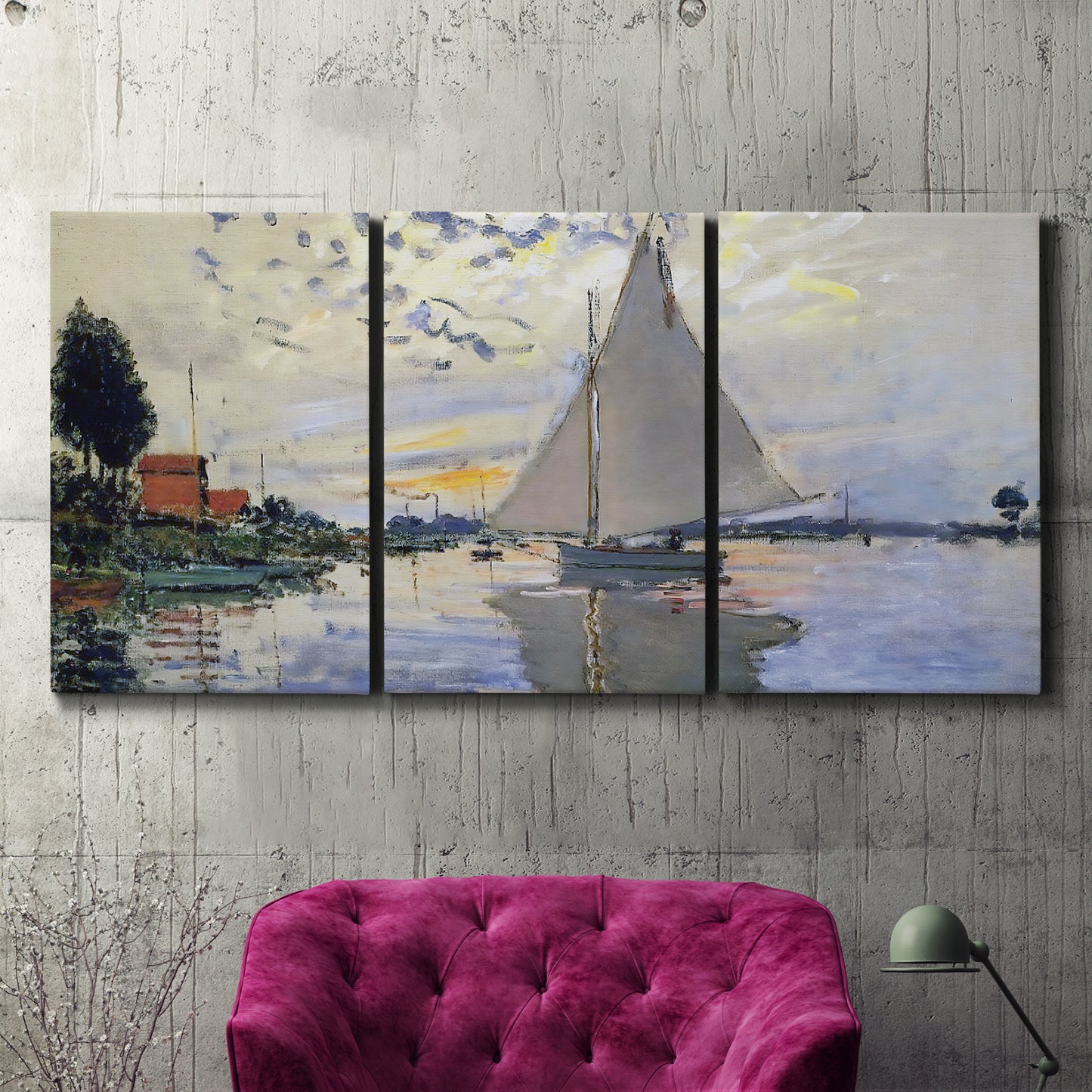 Three-panel canvas wall art featuring riverside village shoreline, displayed in a living room above a suede accent chair.