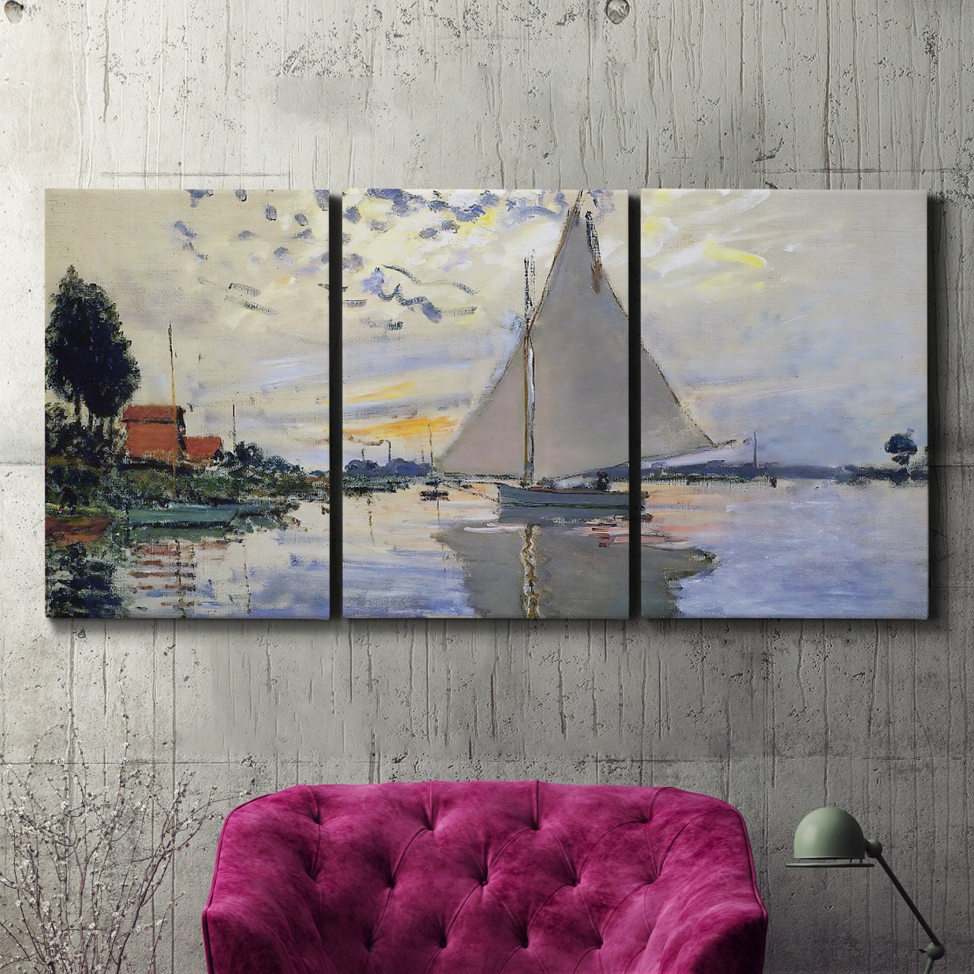 Three-panel canvas wall art featuring riverside village shoreline, displayed in a living room above a suede accent chair.
