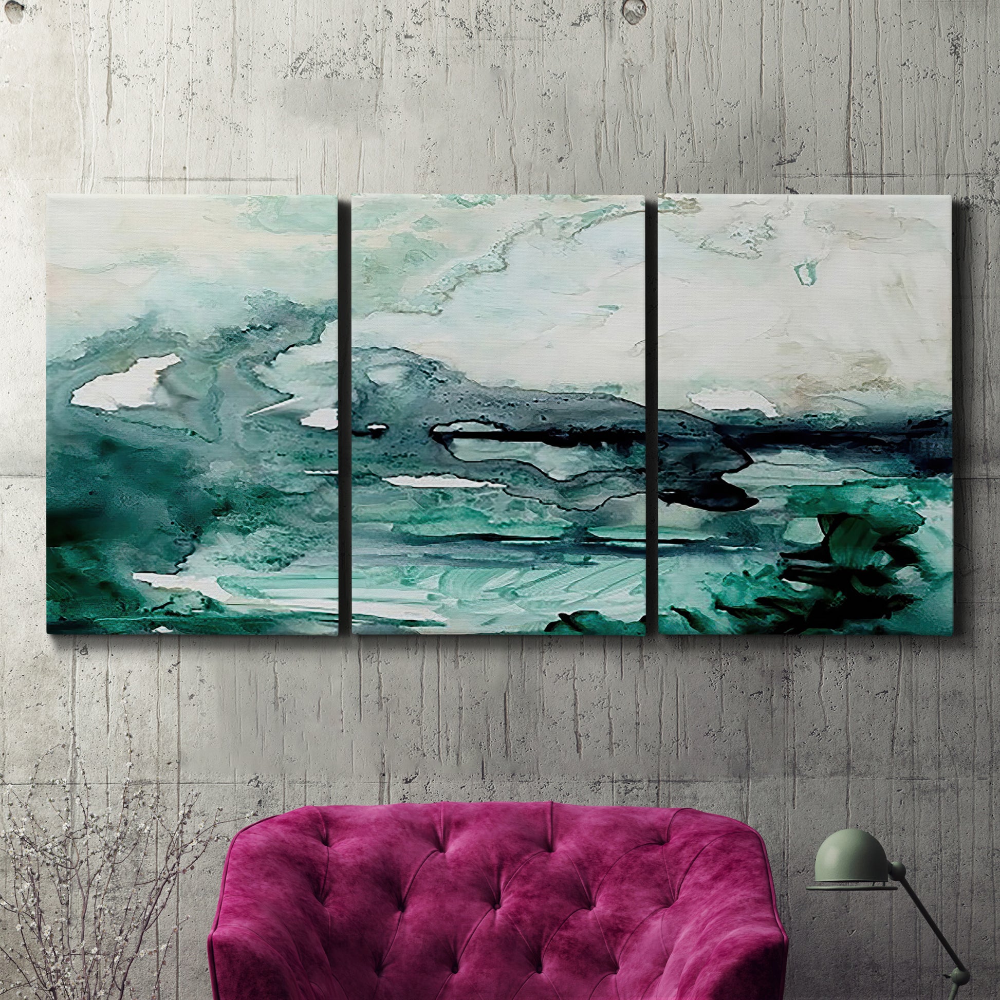 Three-panel canvas wall art featuring coastal abstract sea foam movement, displayed in a living room above a suede accent chair.