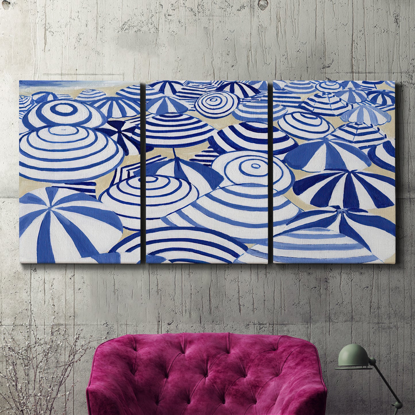 Three-panel canvas wall art featuring geometric abstract bowl forms, displayed in a living room above a suede accent chair.