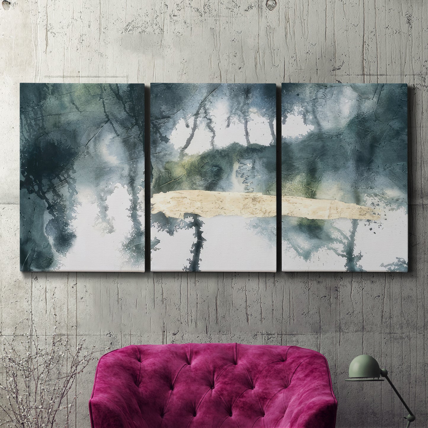 Three-panel canvas wall art featuring saturated abstract color fields, displayed in a living room above a suede accent chair.