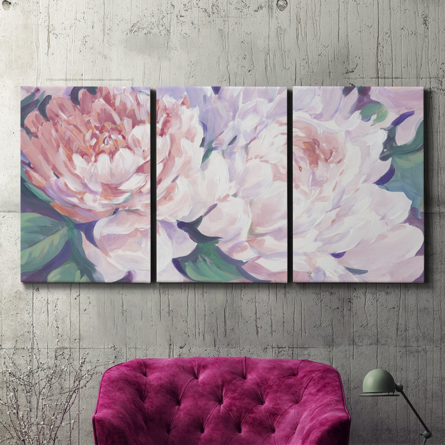 Three-panel canvas wall art featuring soft pink peonies in bloom, displayed in a living room above a suede accent chair.