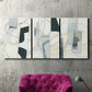 Three-panel canvas wall art featuring interwoven icy abstract linear forms, displayed in a living room above a suede accent chair.