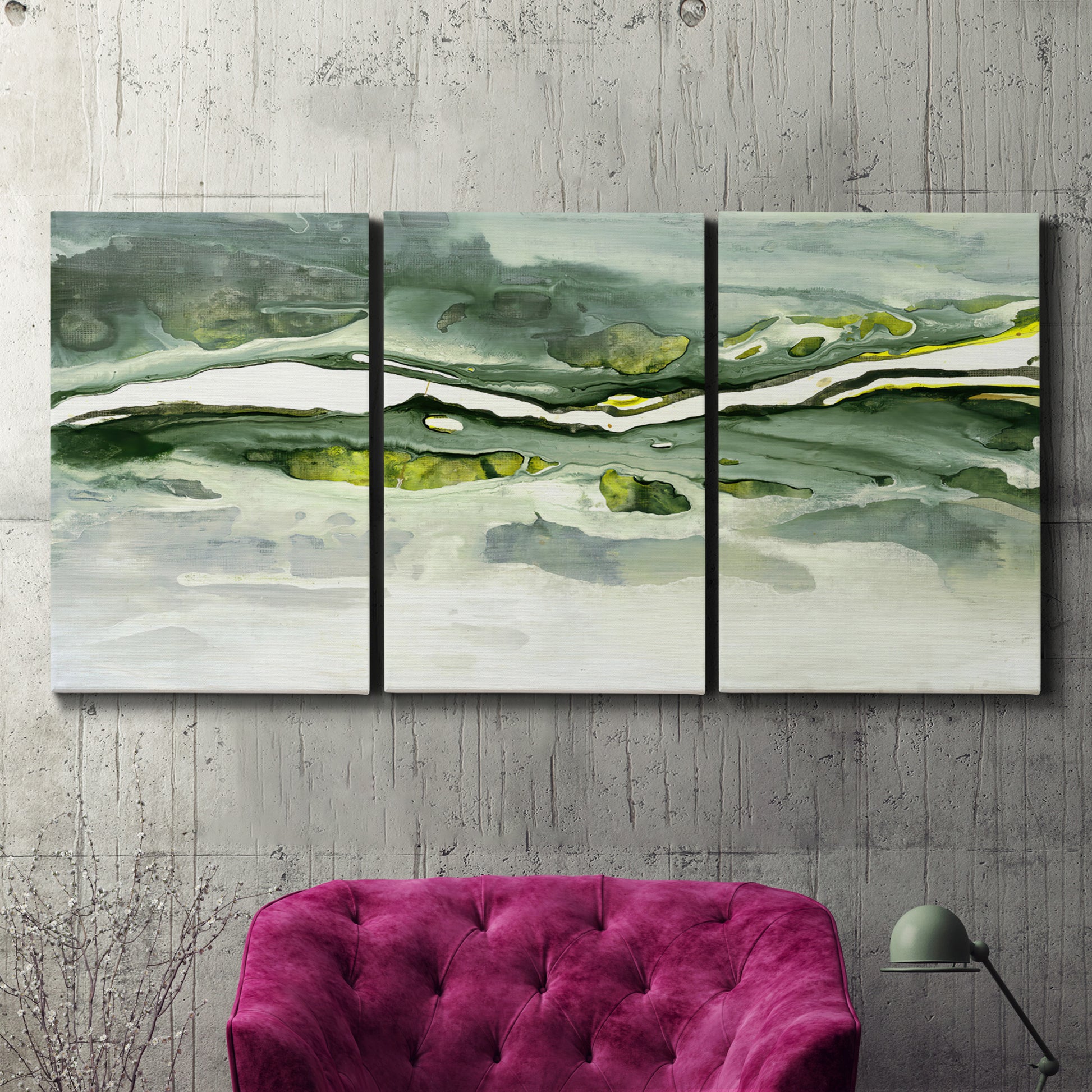 Three-panel canvas wall art featuring abstract passage of time composition, displayed in a living room above a suede accent chair.