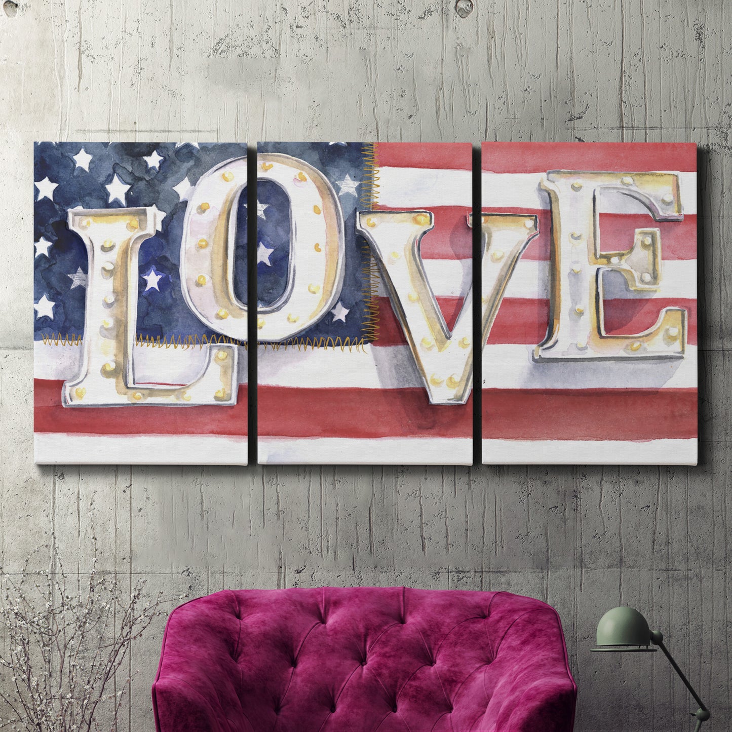 Three-panel canvas wall art featuring patriotic rustic typography art, displayed in a living room above a suede accent chair.