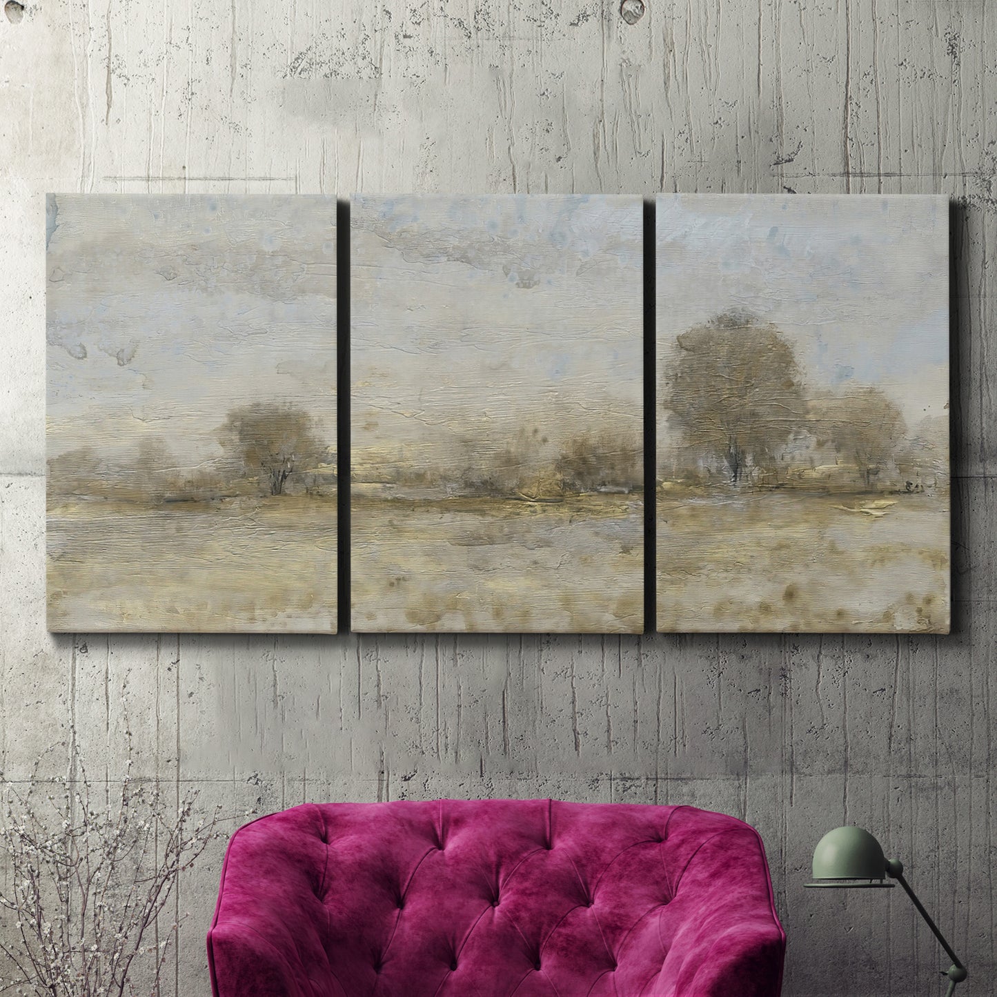 Three-panel canvas wall art featuring late season rural harvest fields, displayed in a living room above a suede accent chair.