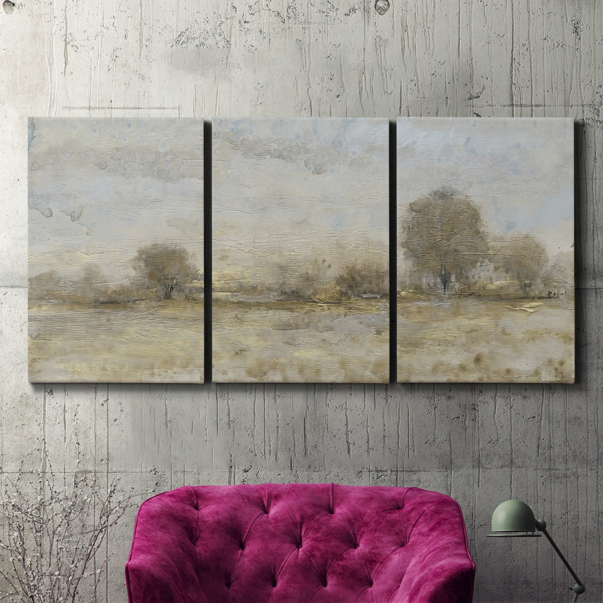 Three-panel canvas wall art featuring late season rural harvest fields, displayed in a living room above a suede accent chair.