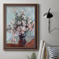 Impressionist chrysanthemum floral painting by Claude Monet in an ornate bronzed mahogany wood frame displayed in a neutral interior setting.