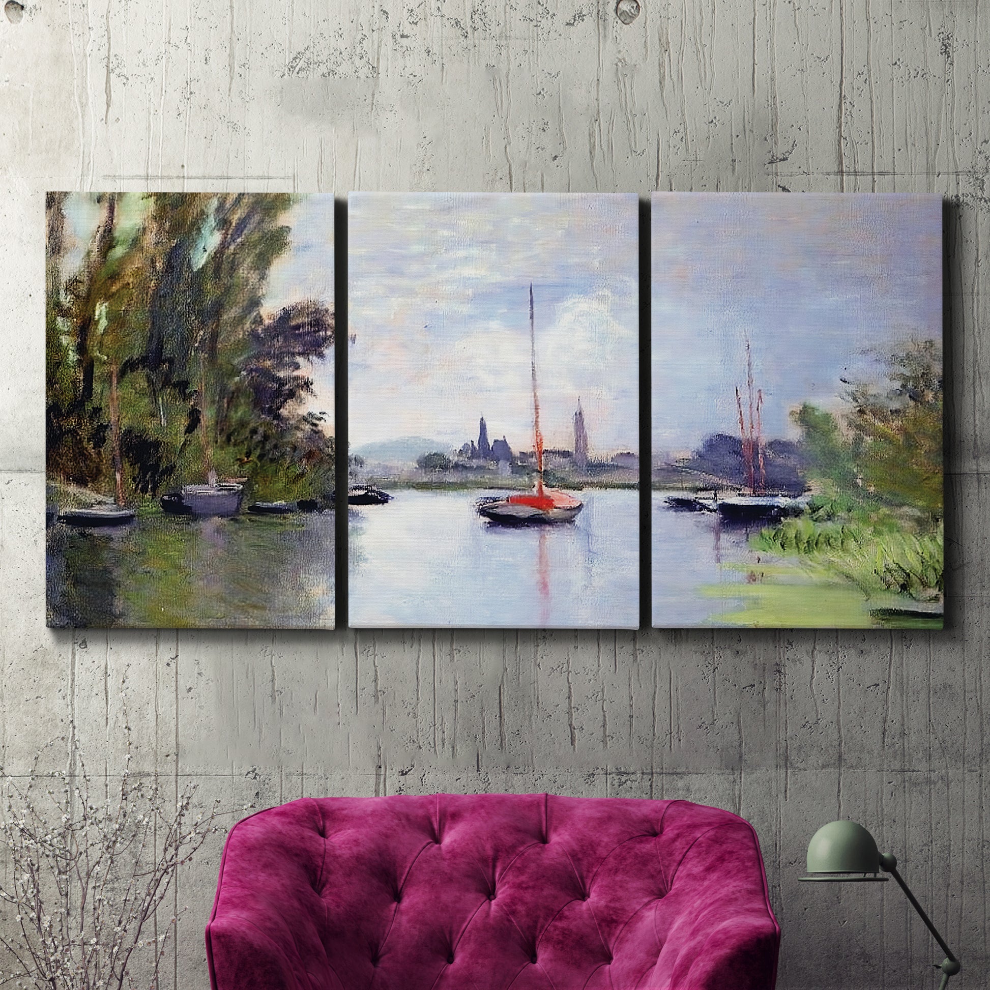 Three-panel canvas wall art featuring river view with boats and reflections, displayed in a living room above a suede accent chair.