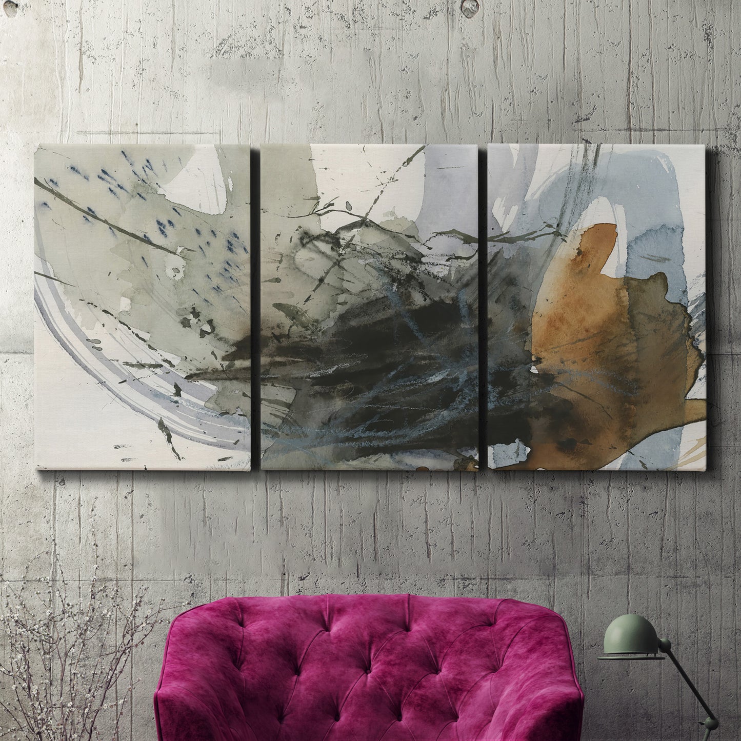 Three-panel canvas wall art featuring dynamic circular abstract motion, displayed in a living room above a suede accent chair.