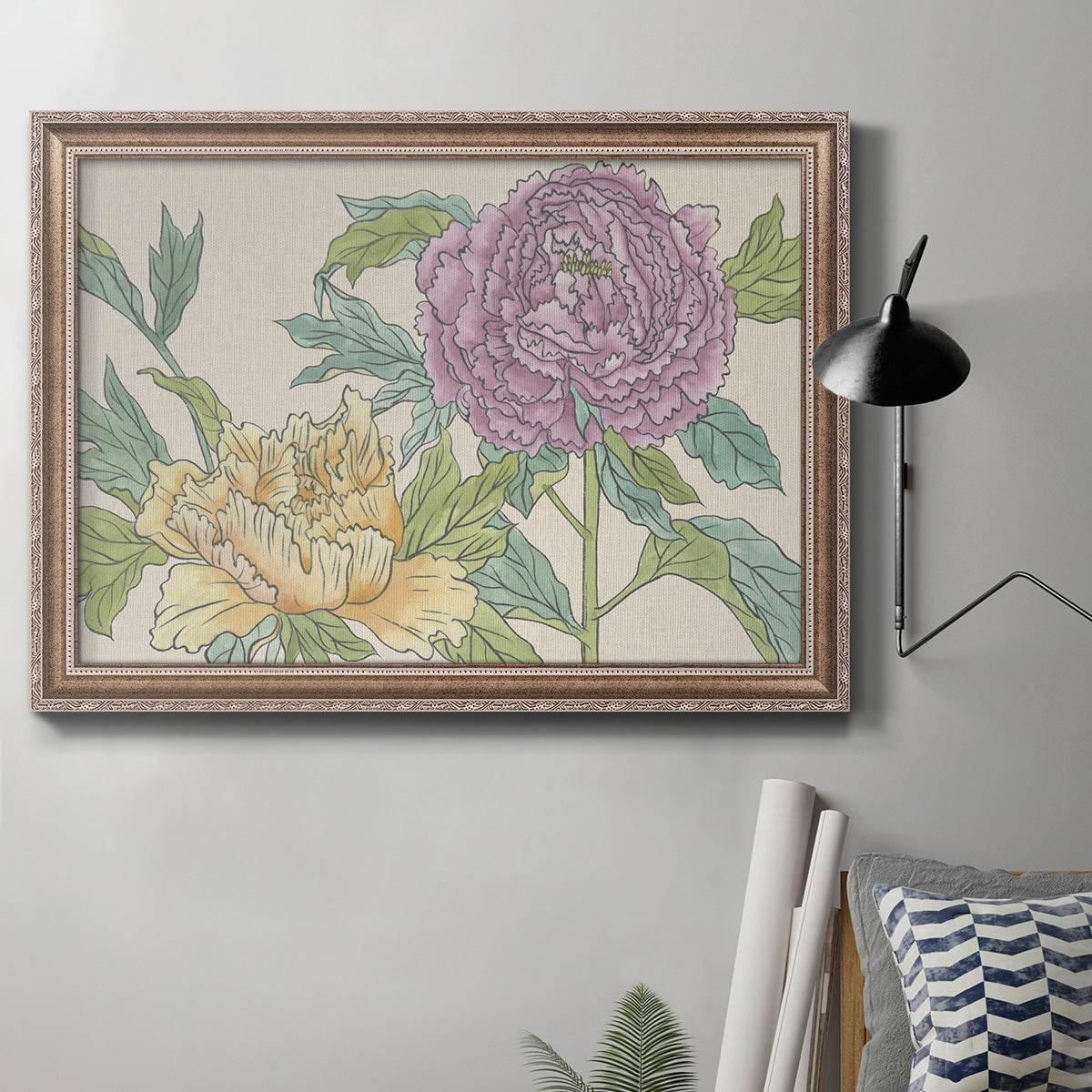 Contemporary peony flower illustration in an ornate traditional silver frame displayed in a neutral interior setting.