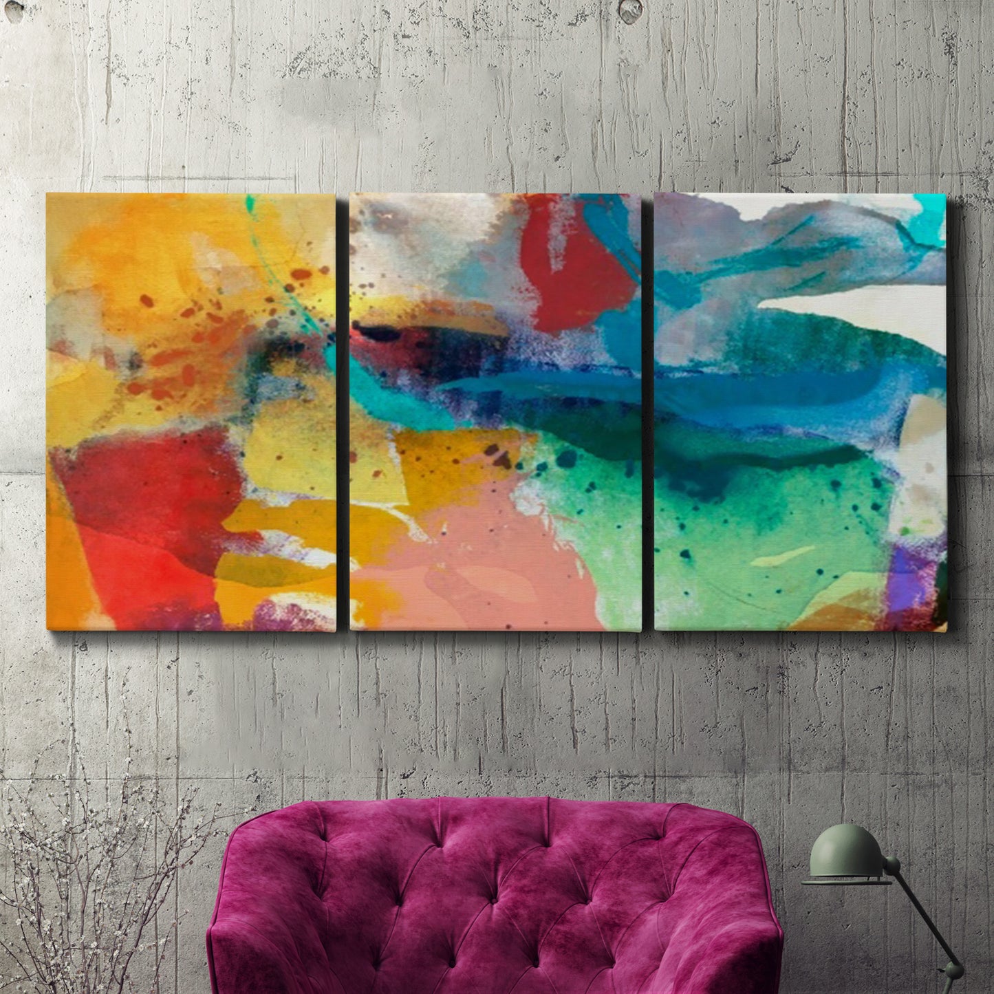 Three-panel canvas wall art featuring layered abstract observational color blocks, displayed in a living room above a suede accent chair.