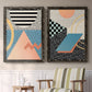 Set of two black barnwood framed canvas prints depicting two retro graphic abstracts featuring bold geometric Memphis-style patterns above a sideboard in a cozy sitting room.