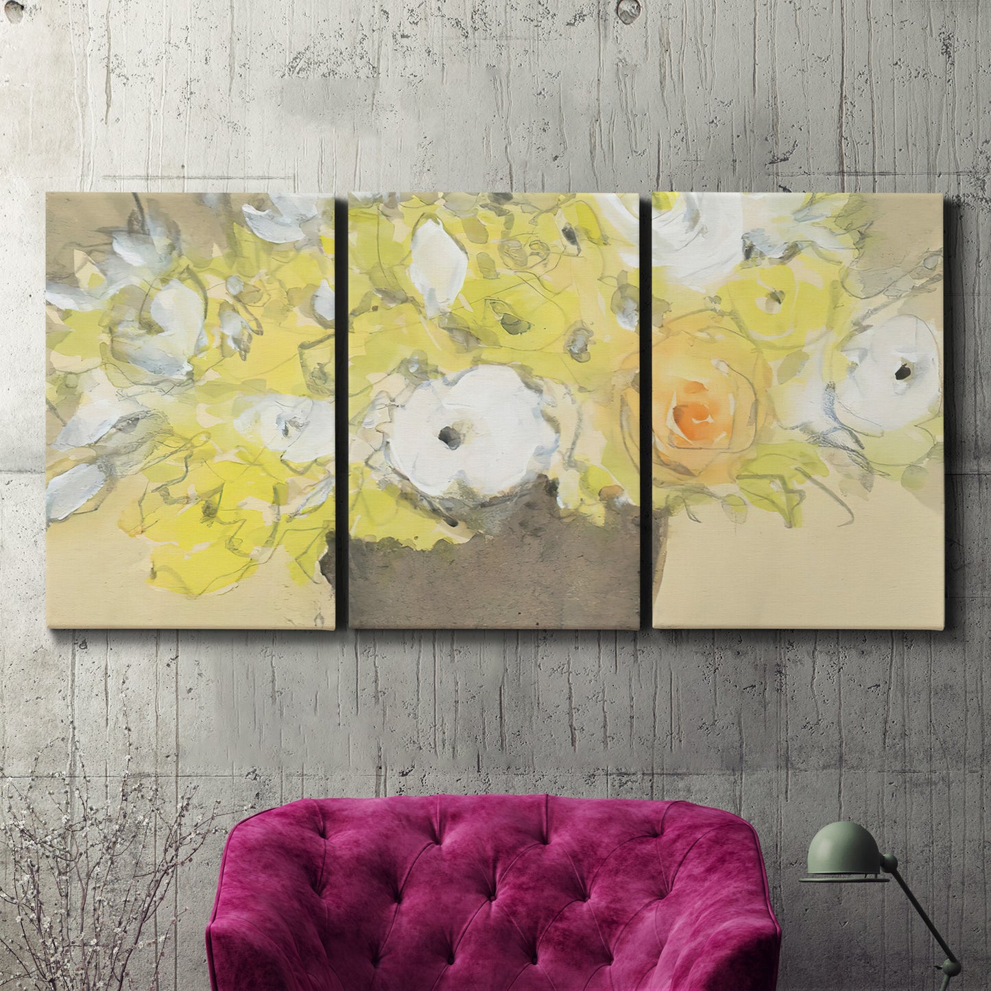 Three-panel canvas wall art featuring abstract floral table arrangement, displayed in a living room above a suede accent chair.