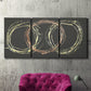 Three-panel canvas wall art featuring geometric abstract wave tangents, displayed in a living room above a suede accent chair.