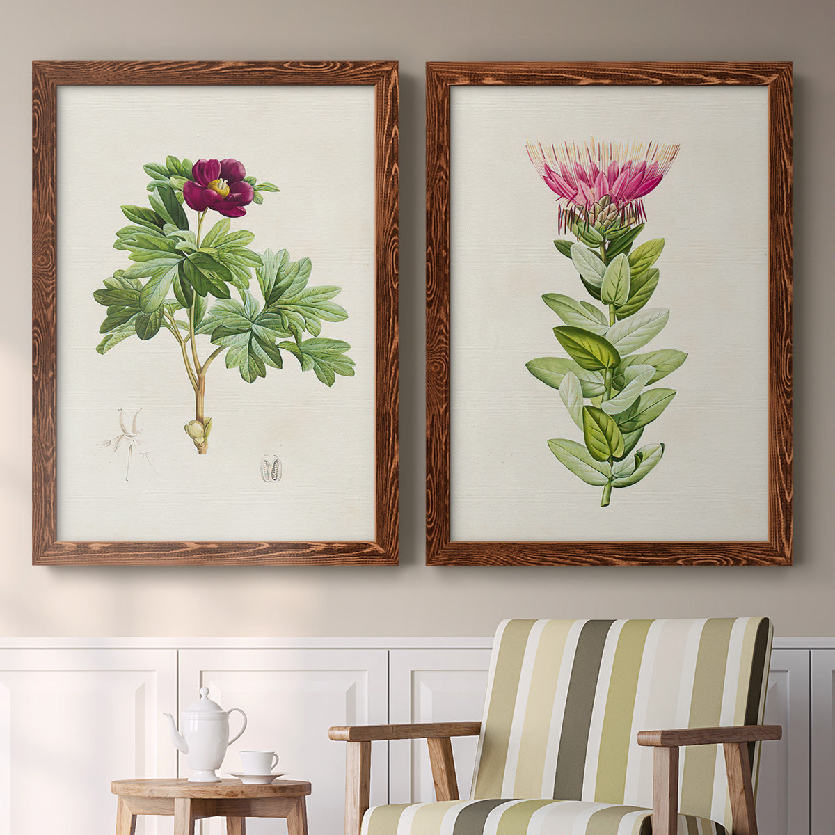 Set of two maple barnwood framed canvas prints depicting two vintage botanical plate illustrations featuring pink flowering plant specimens above a sideboard in a cozy sitting room.