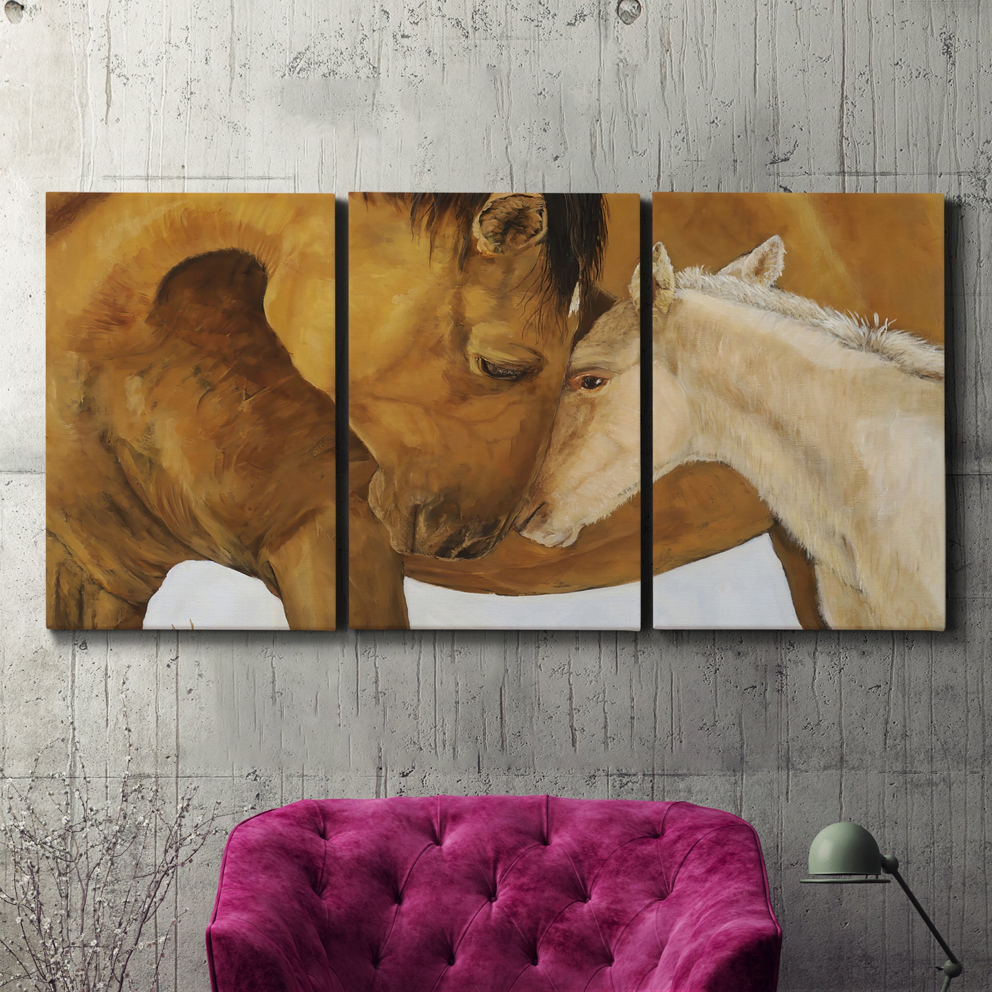 Three-panel canvas wall art featuring gentle horse portrait illustration, displayed in a living room above a suede accent chair.