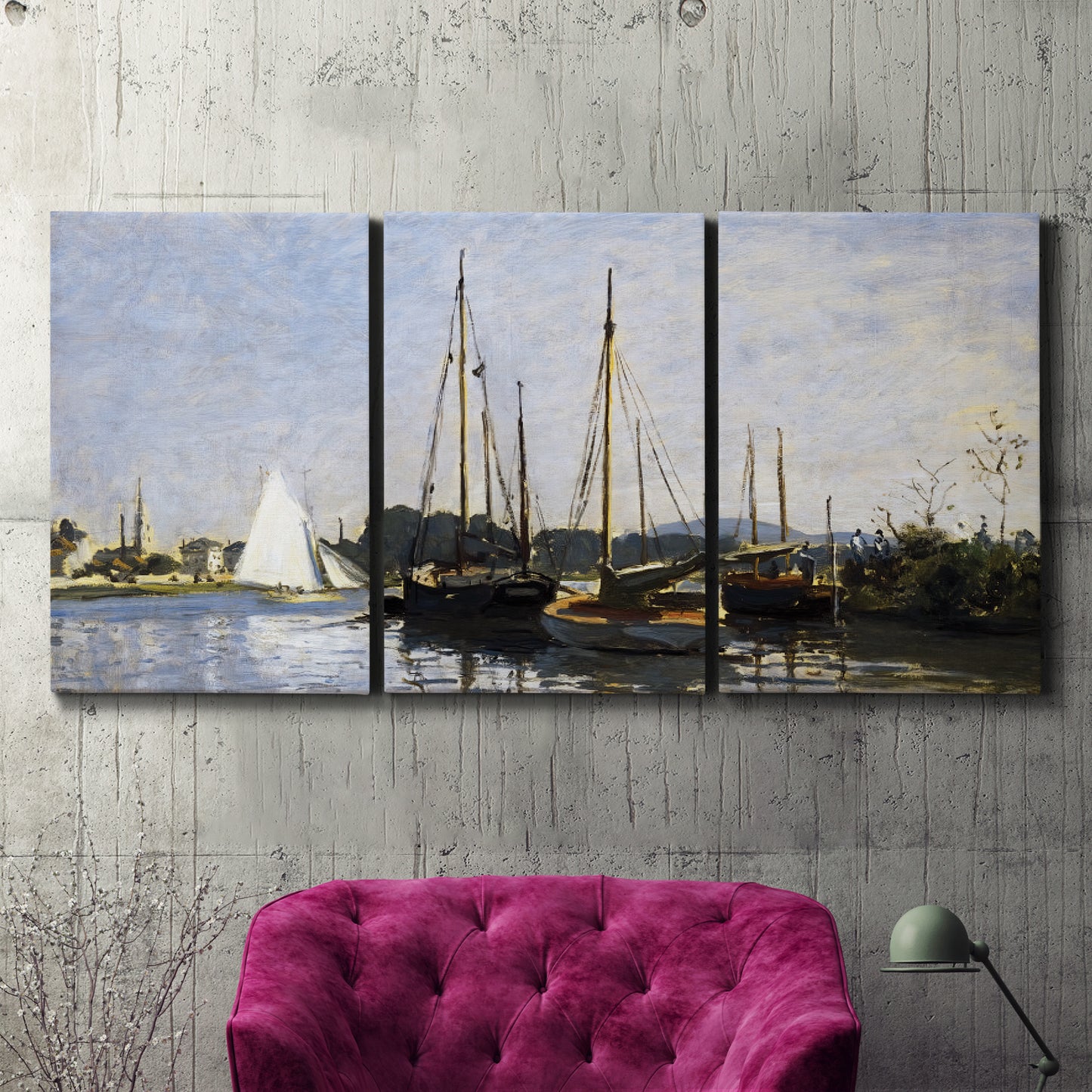 Three-panel canvas wall art featuring small pleasure boats on calm water, displayed in a living room above a suede accent chair.