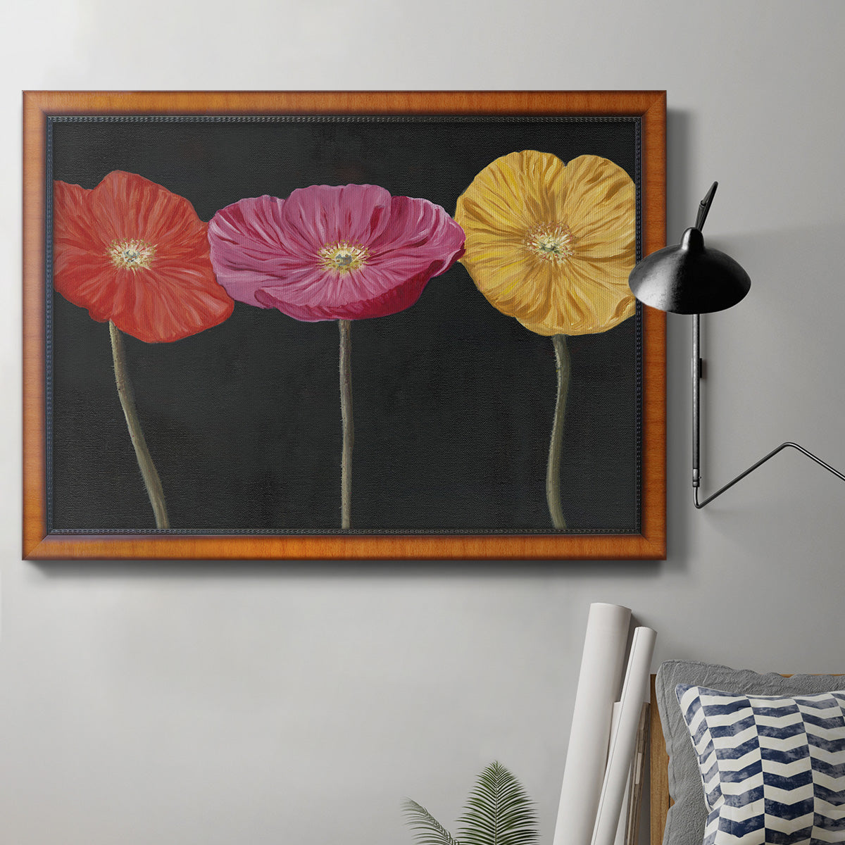 Contemporary poppy flower artwork in an ornate vintage burl wood frame displayed in a neutral interior setting.