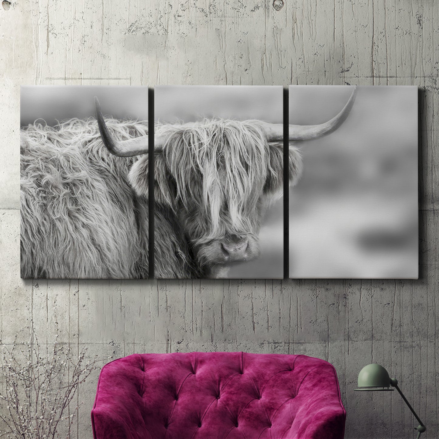 Three-panel canvas wall art featuring large highland cow portrait, displayed in a living room above a suede accent chair.
