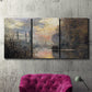 Three-panel canvas wall art featuring winter river sunset with reflections, displayed in a living room above a suede accent chair.