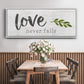 Love Never Fails - Floater Framed Canvas Print