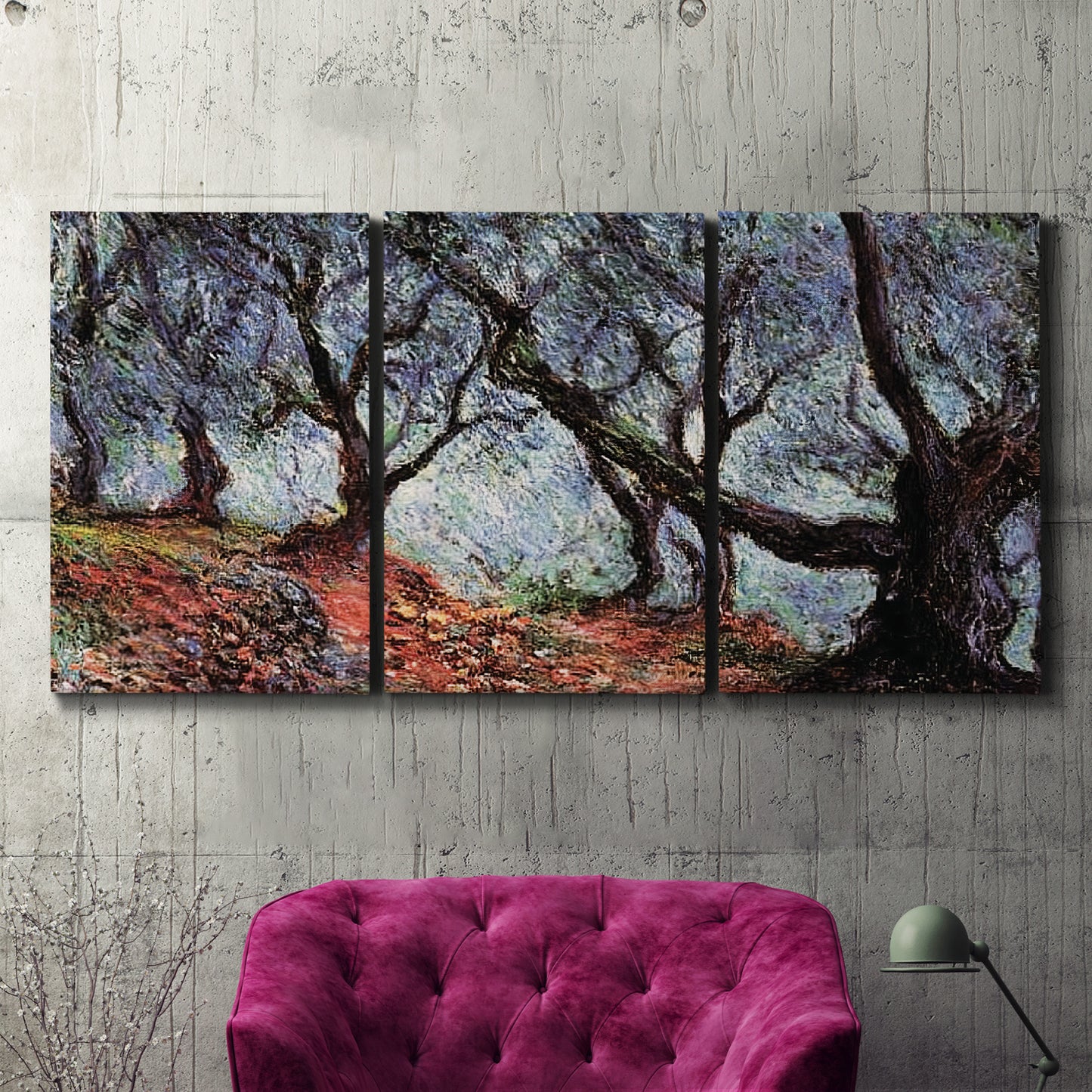 Three-panel canvas wall art featuring pine trees silhouetted at evening, displayed in a living room above a suede accent chair.