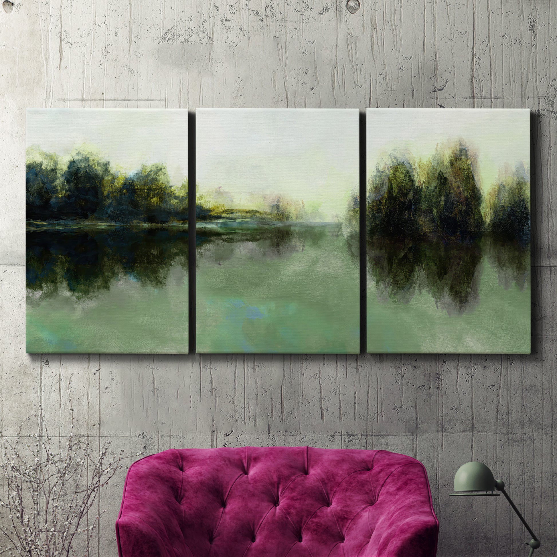 Three-panel canvas wall art featuring rain soaked landscape at sunset, displayed in a living room above a suede accent chair.