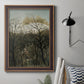 Dreamlike forest landscape scene by Henri Rousseau in an ornate bronzed mahogany wood frame displayed in a neutral interior setting.