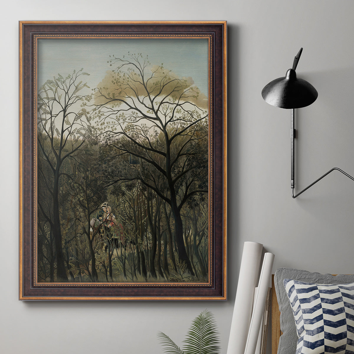 Dreamlike forest landscape scene by Henri Rousseau in an ornate bronzed mahogany wood frame displayed in a neutral interior setting.