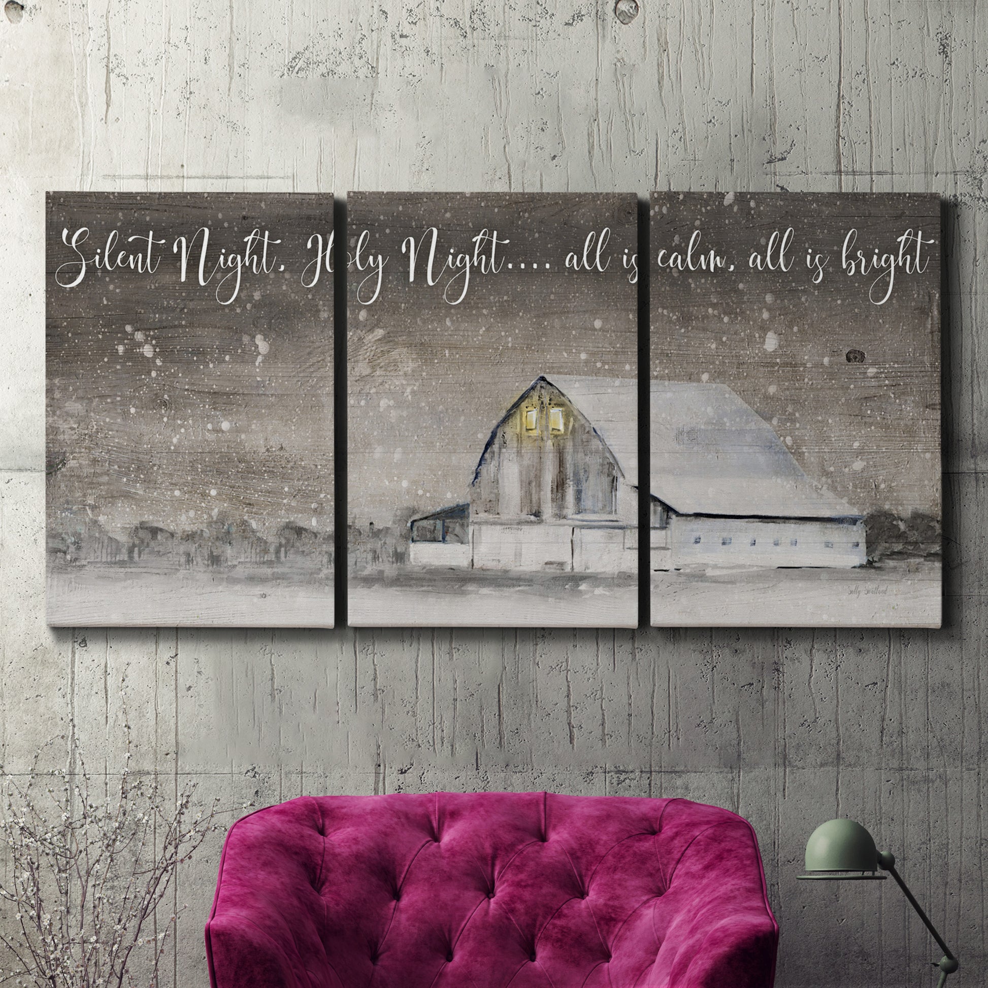 Three-panel canvas wall art featuring rustic winter holiday text art, displayed in a living room above a suede accent chair.